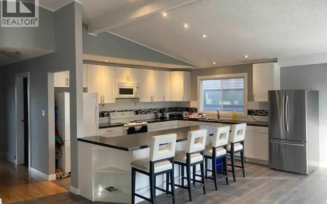 2457 22A Street NW, Banff Trail — Multi-Family for sale